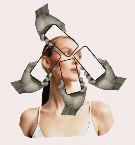 An image of a blond woman with hands holding phone screens in front of it to illustrate the concept that social media...
