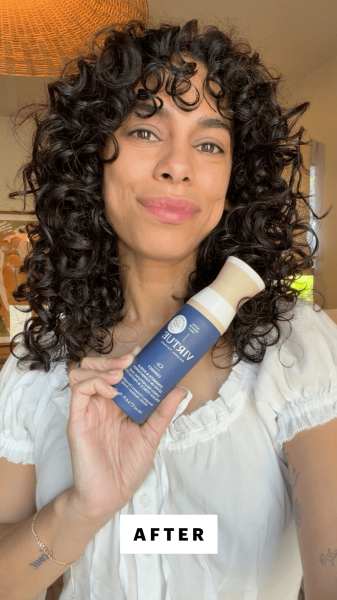 A selfie of Allure senior commerce director Shanna Shipin after using the Virtue Correct Strength Shield LeaveIn...